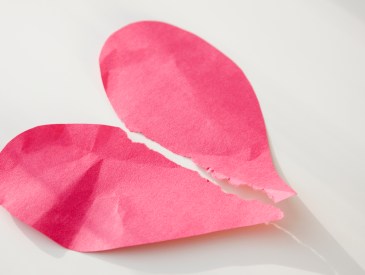 Paper heart ripped in half