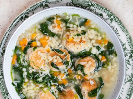 Italian wedding soup with meatballs, spinach and ptitim paste