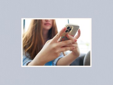 teen girl using a smartphone.