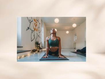 Woman doing upward facing dog stretch