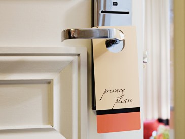 Sign on hotel room door